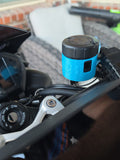 Sea Blue 3D-printed brake reservoir cover on the bars of Nathan's 2026 Triumph Street Triple RS