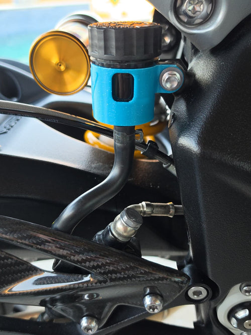 Sea Blue 3D-printed rear brake reservoir cover on a Triumph Street Triple RS